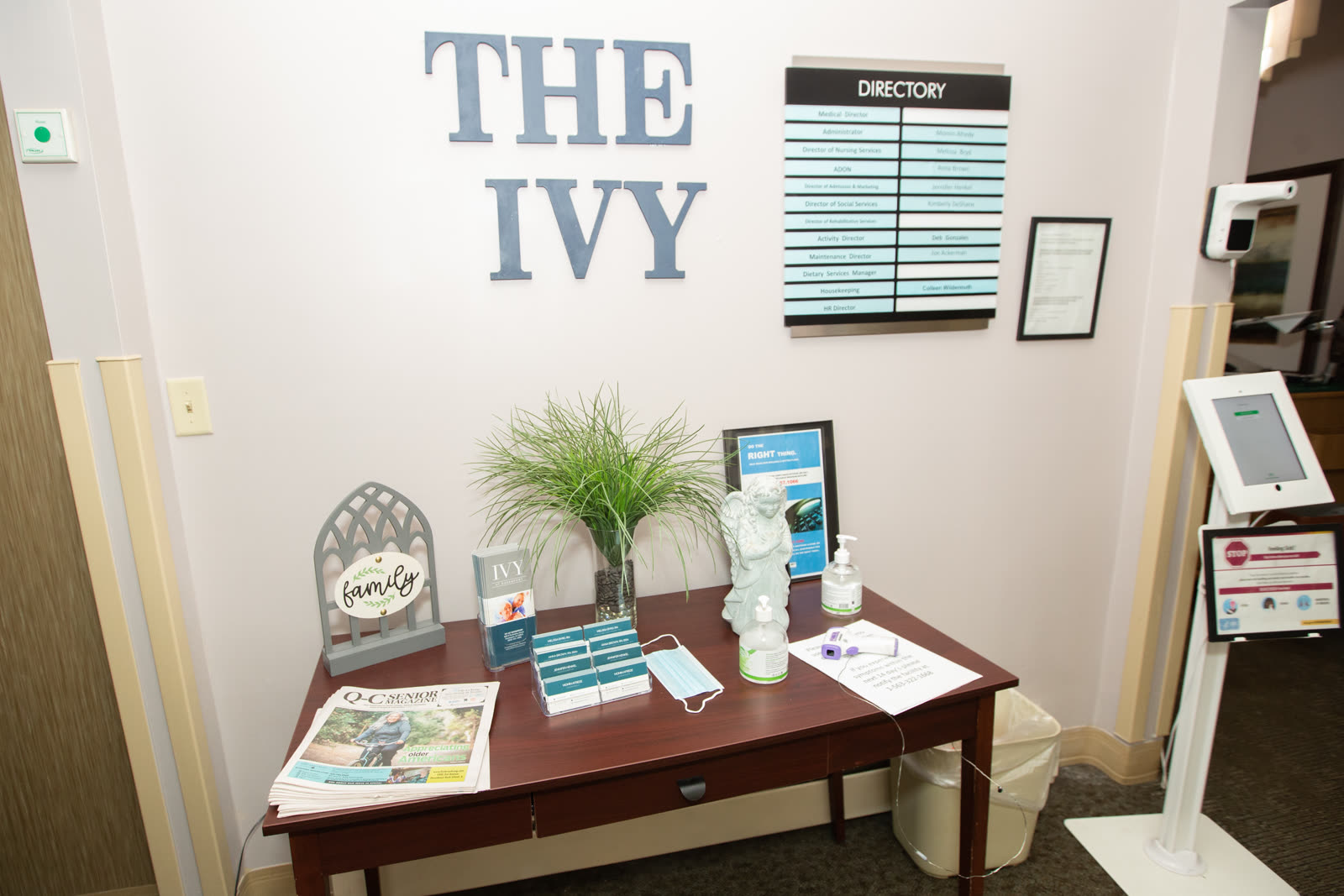 The Ivy at Davenport reception area with the resident directory and a warm, home-like welcome